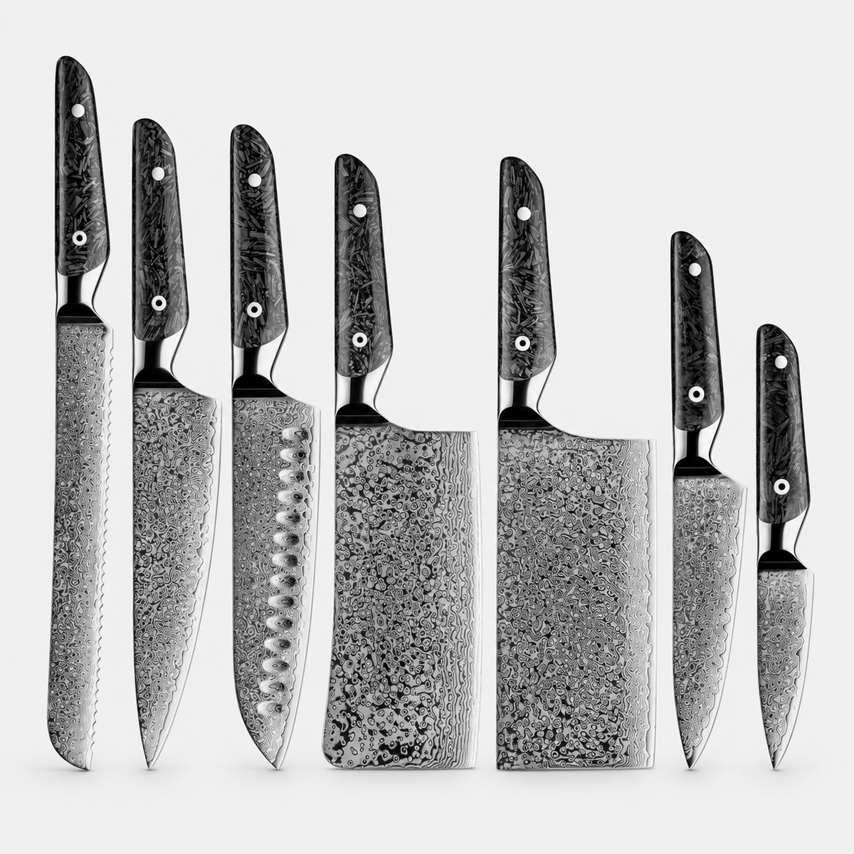 Carbone Intégral — 7 couteaux Damas et coffret — vue complète sur fond gris