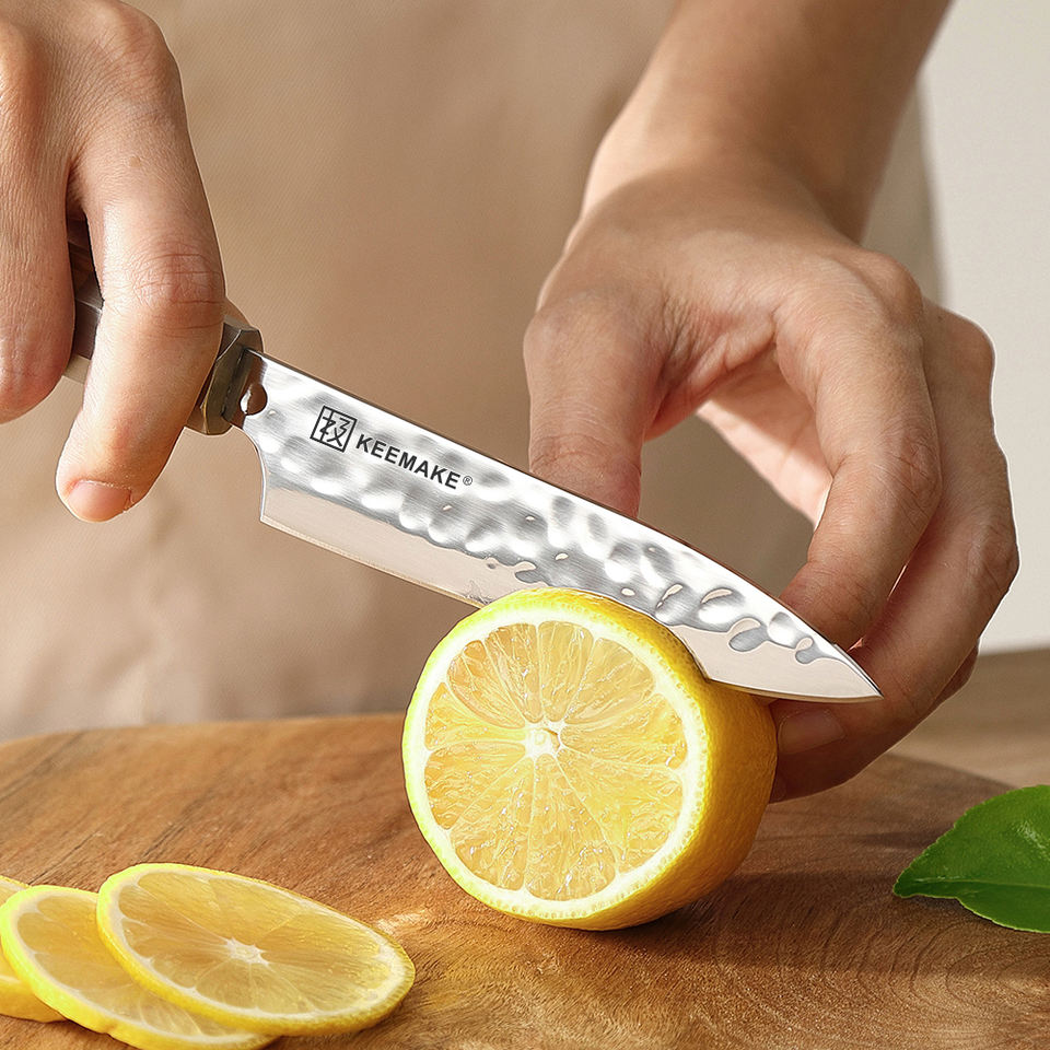 Couteau utilitaire Signature — 12,7 cm — détail et mise en situation